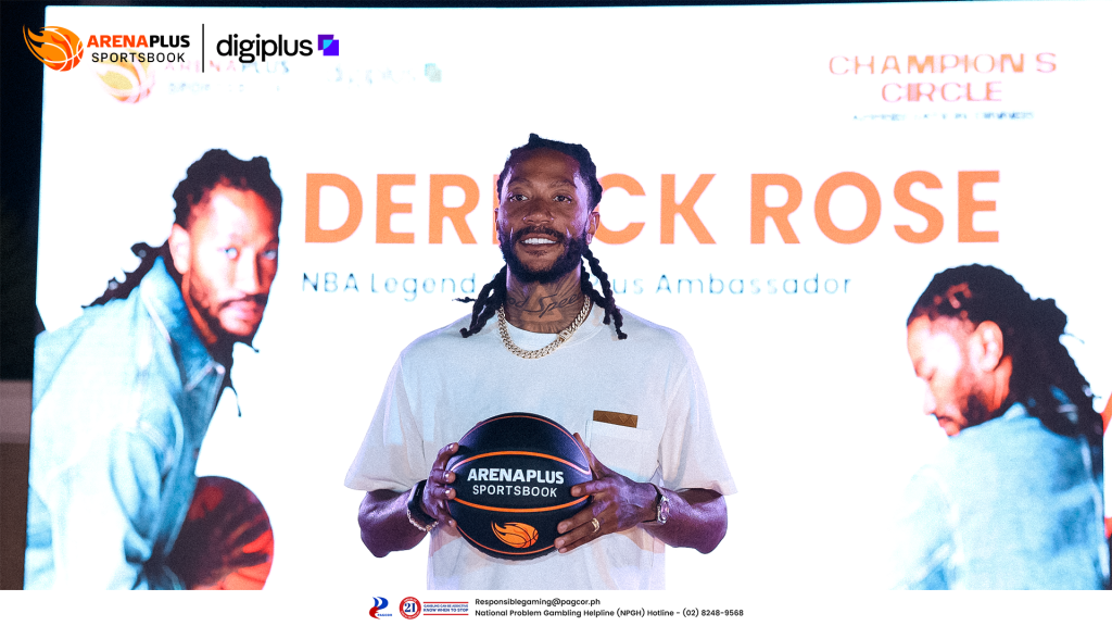 Derrick Rose holds an ArenaPlus Sportsbook basketball in front of a large event display featuring his name and images.